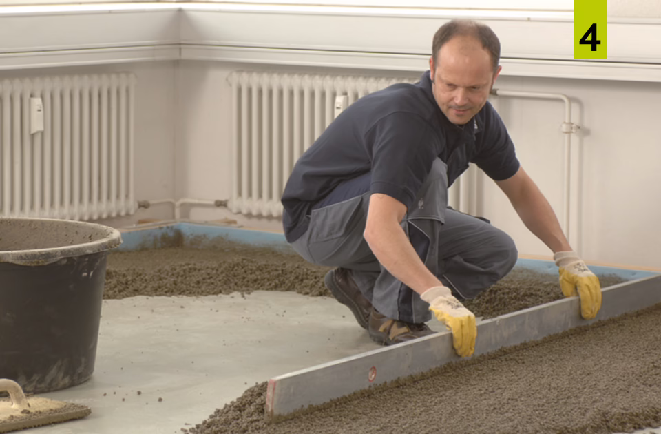 Apply and level screed in the recommended thickness.